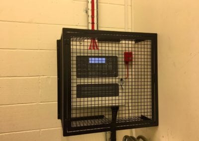 Metal cage for control unit. Bancroft’s School, Woodford Green, Essex